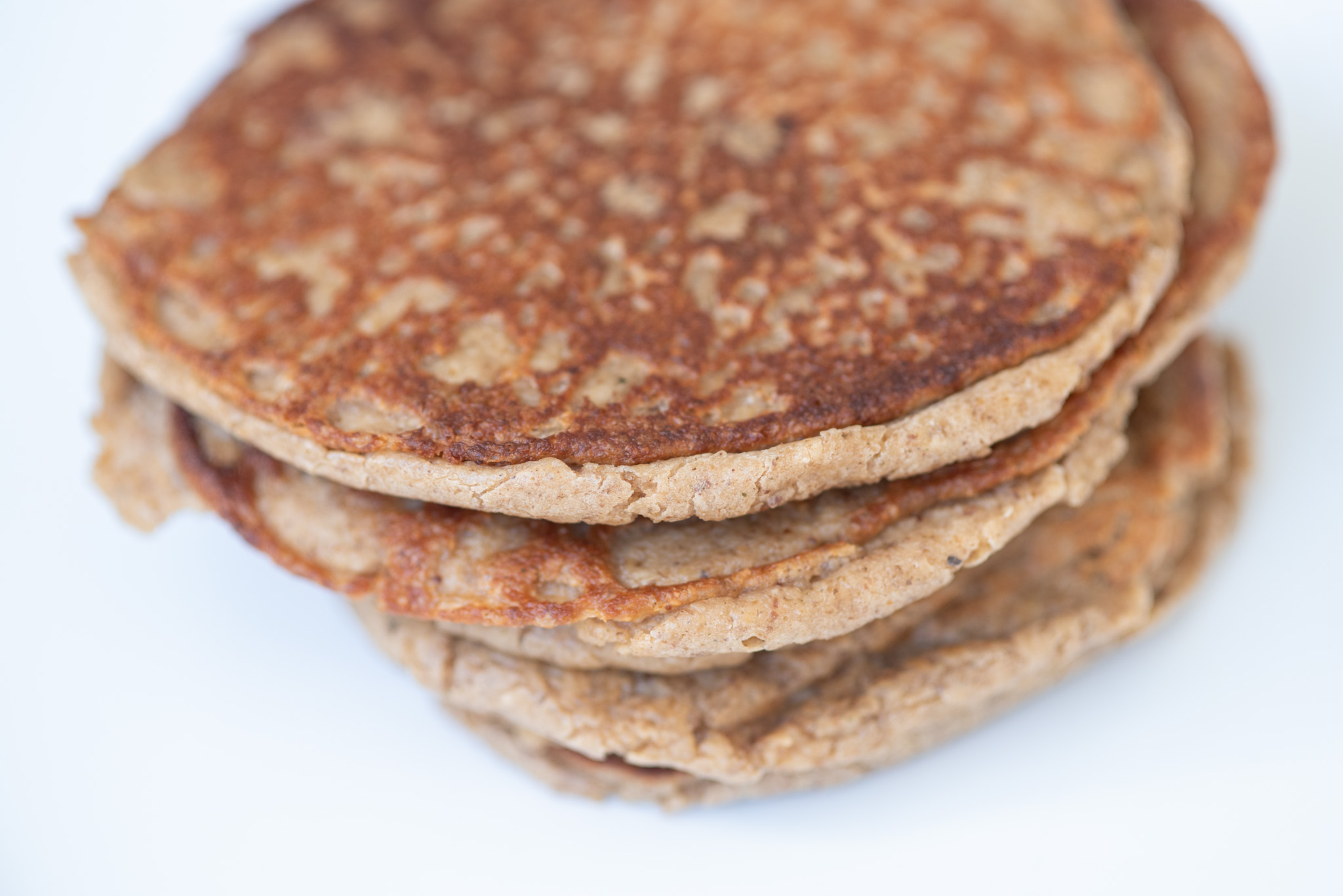 Oat flour pancakes with fruit and nuts